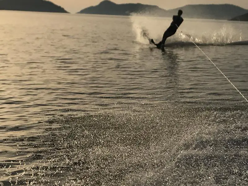 Guest waterskiing behind the diesel inflatable boat