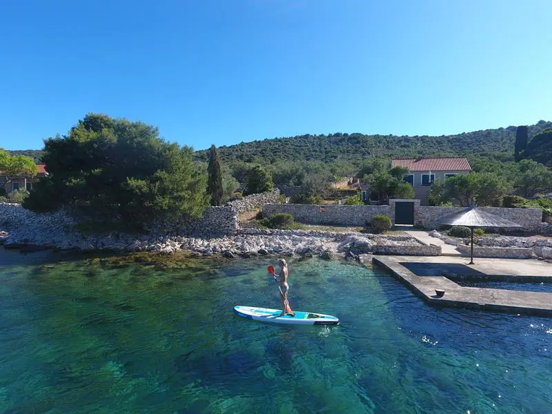 Guest using a paddle board.