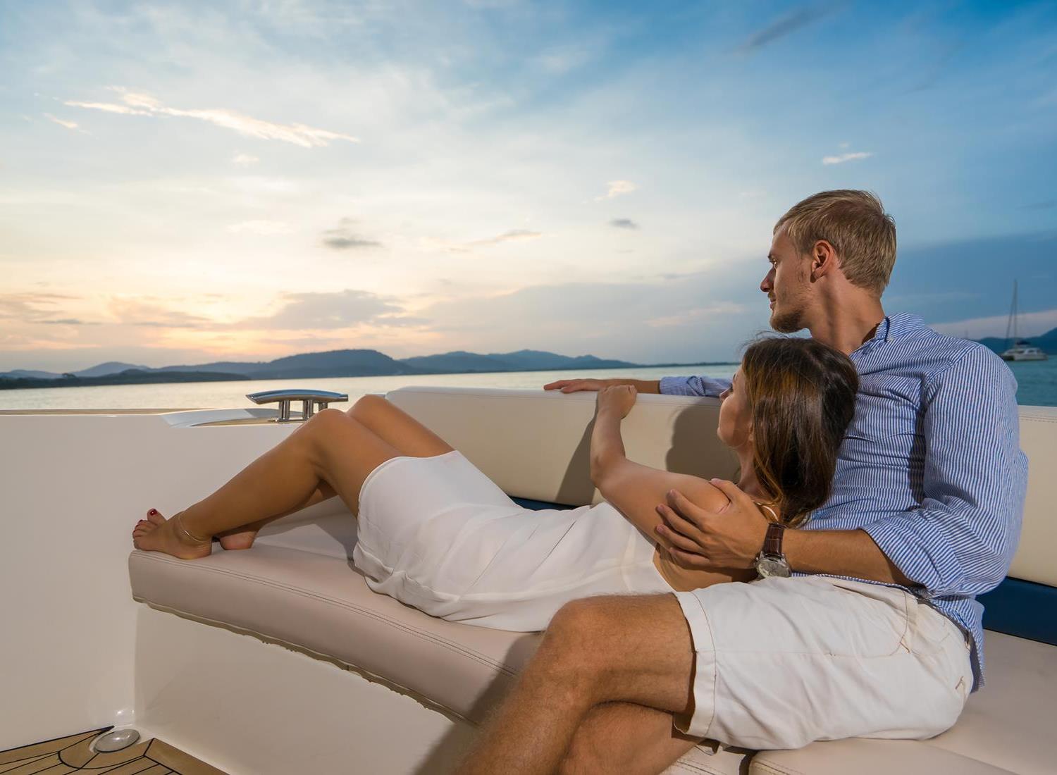Couple enjoying sunset deckside