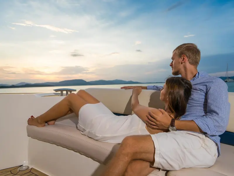Couple enjoying sunset deckside
